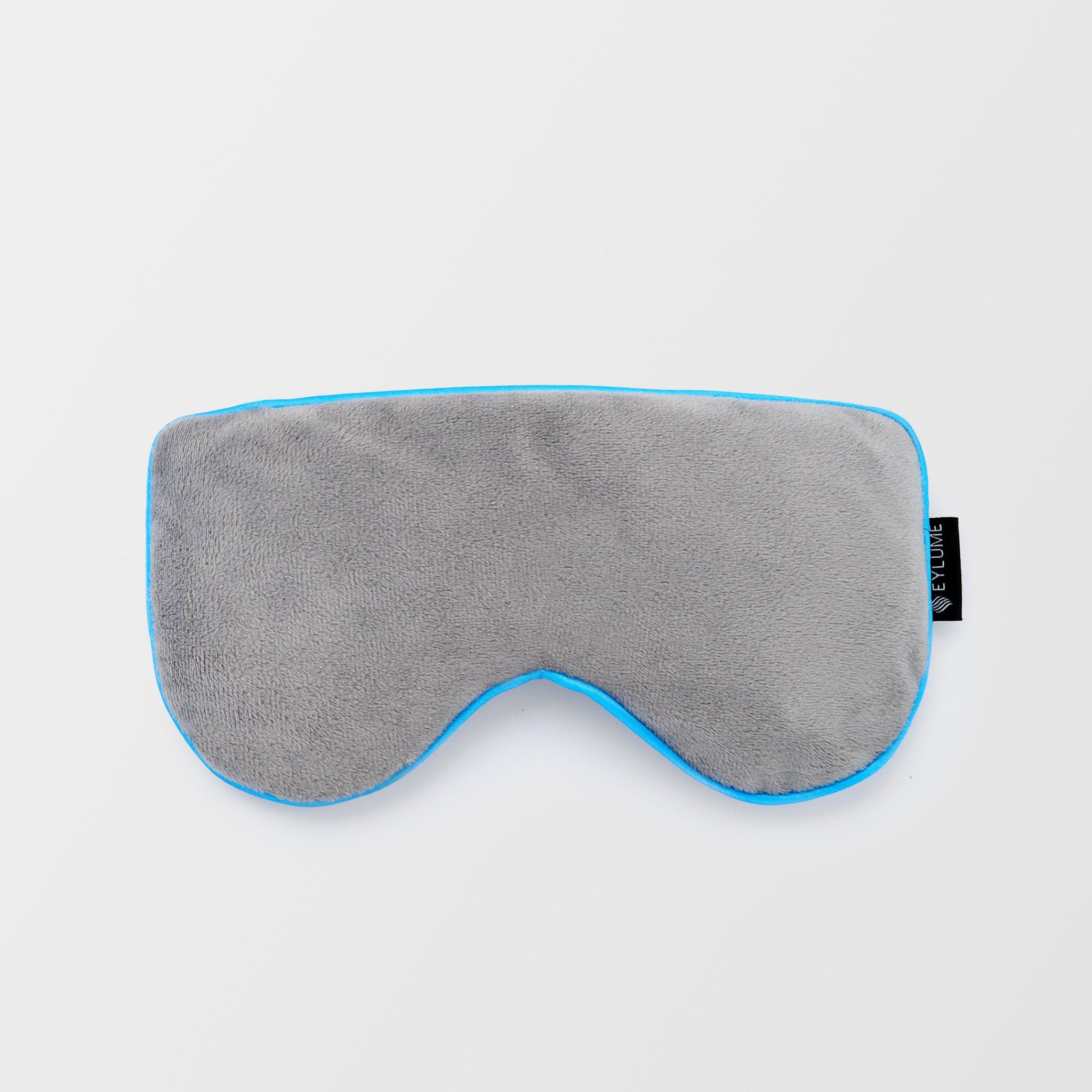 Top view of the EYLUME Calm Heated Eye Mask showing its soft plush exterior and ergonomic design