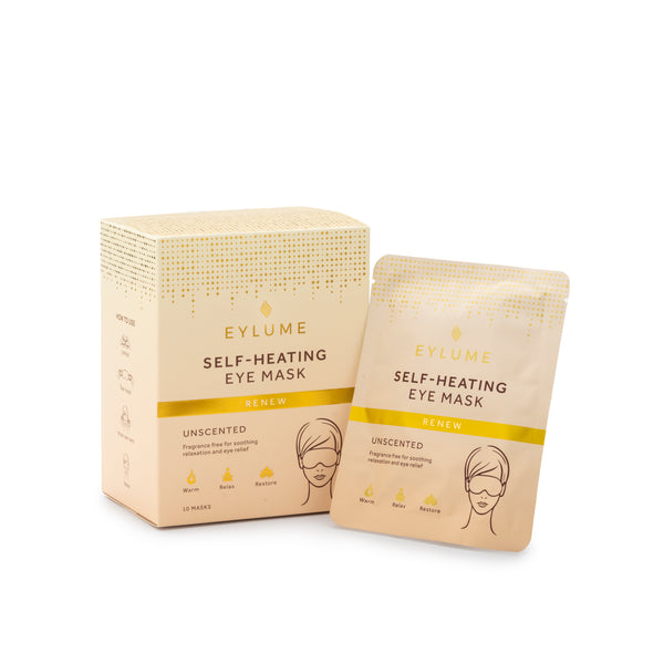EYLUME Renew self heating eye mask unscented box displayed with an individual warming eye mask sachet