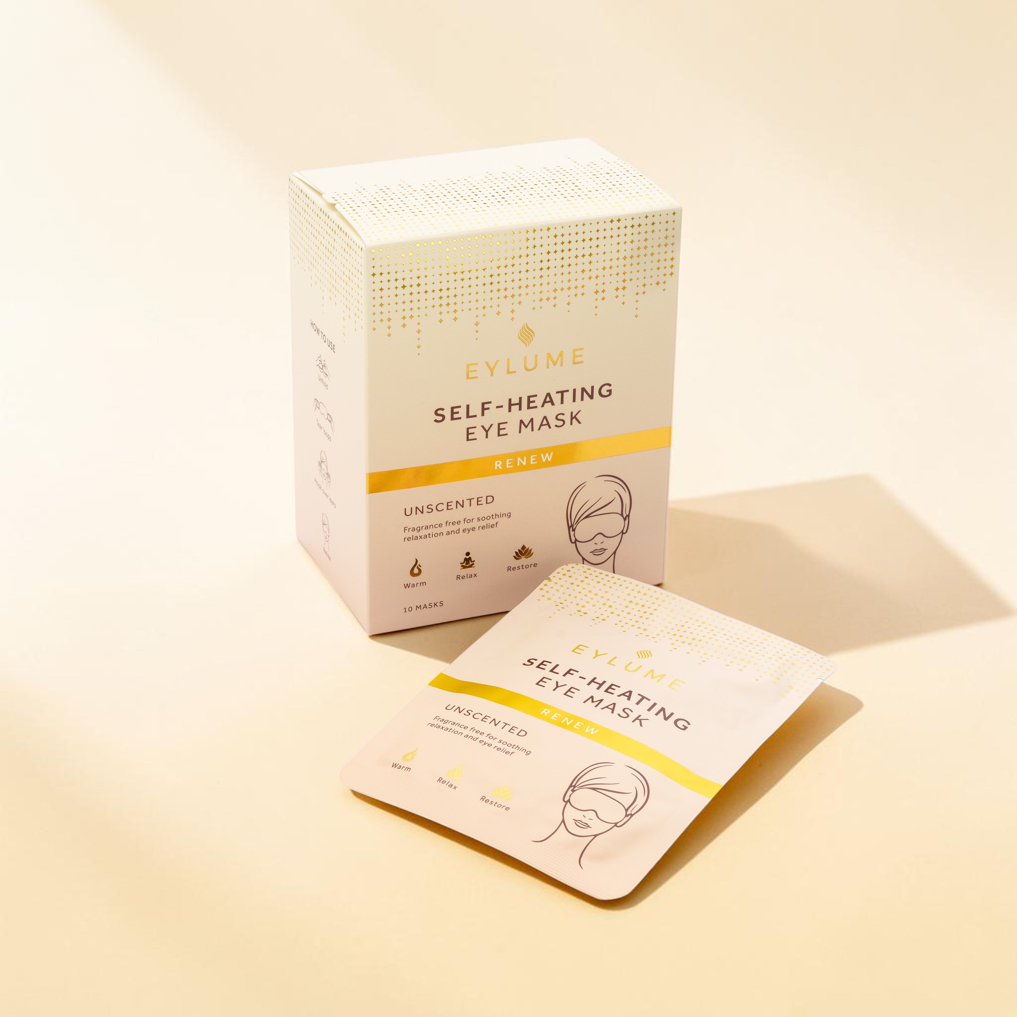 EYLUME RENEW unscented self-heating eye mask box and sachet displayed on a clean premium wellness background.