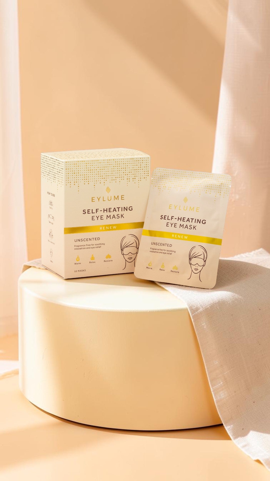 EYLUME Renew self-heating eye mask in the unscented variant displayed on a premium wellness-inspired background